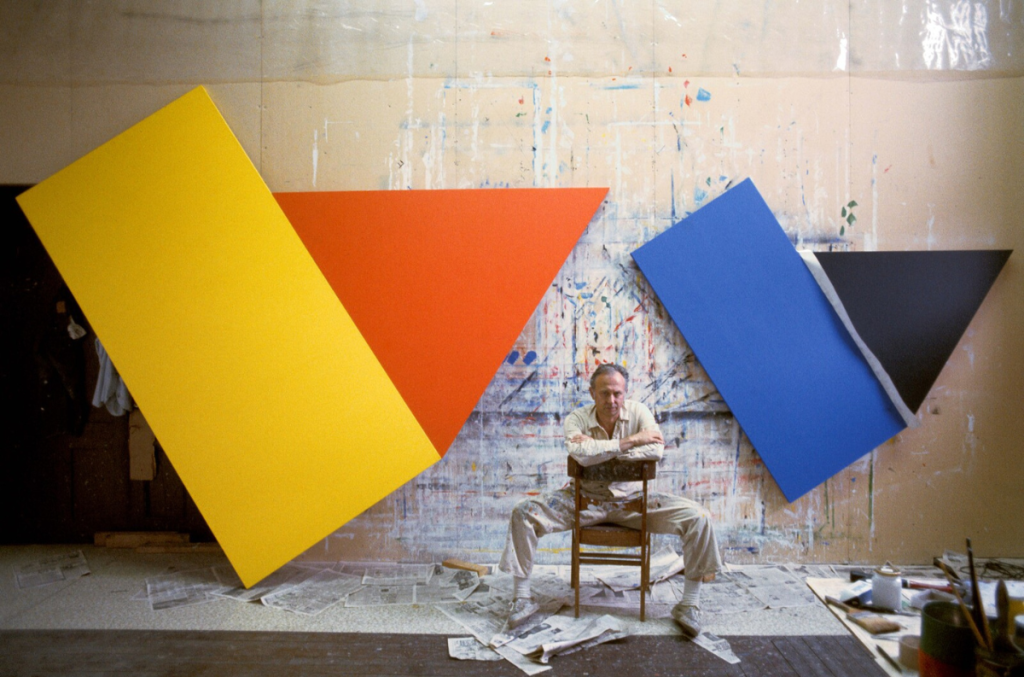 Gianfranco Gorgoni. Ellsworth Kelly with Yellow with Red Triangle and Blue with Black Triangle in his studio in Cady’s Hall, Chatham, New York, 1973. Courtesy - e-flux