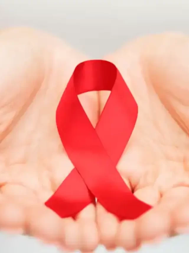 Hands_cradling_a_red_ribbon_Courtesy_-_Psychology_Today
