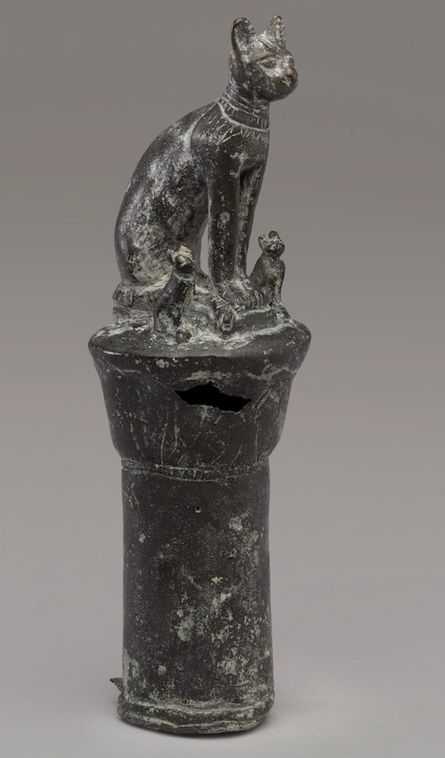 Goddess Bastet as a Cat on a Lotus Column, 664‐30 BCE, bronze. Image Courtesy: Brooklyn Museum