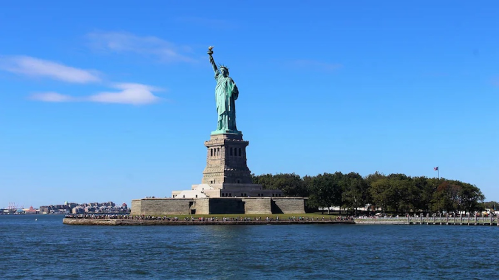 Located at the New York Harbour, the statue of liberty welcomes immigrants