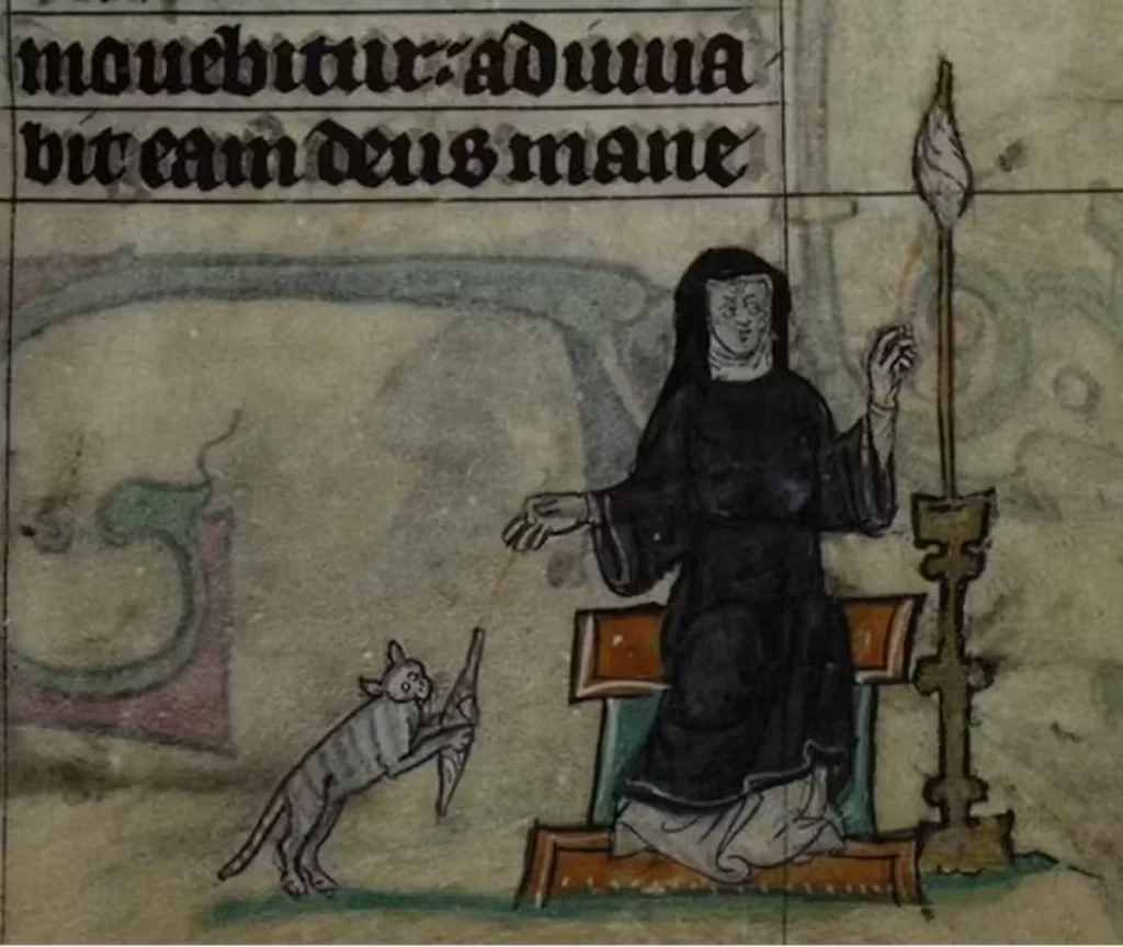 Detail of a miniature of a nun spinning thread, as her pet cat plays with the spindle; from the Maastricht Hours, the Netherlands (Liège), 1st quarter of the 14th century, Stowe manuscript 17, folio 34r. Image Courtesy: Bangor University
