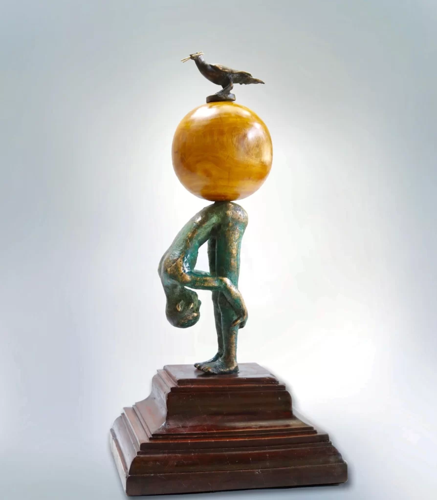 Gunasekar Jeyapal. Life In The City (2019). Bronze, wood, and recycled wood, 24x12x12 in.