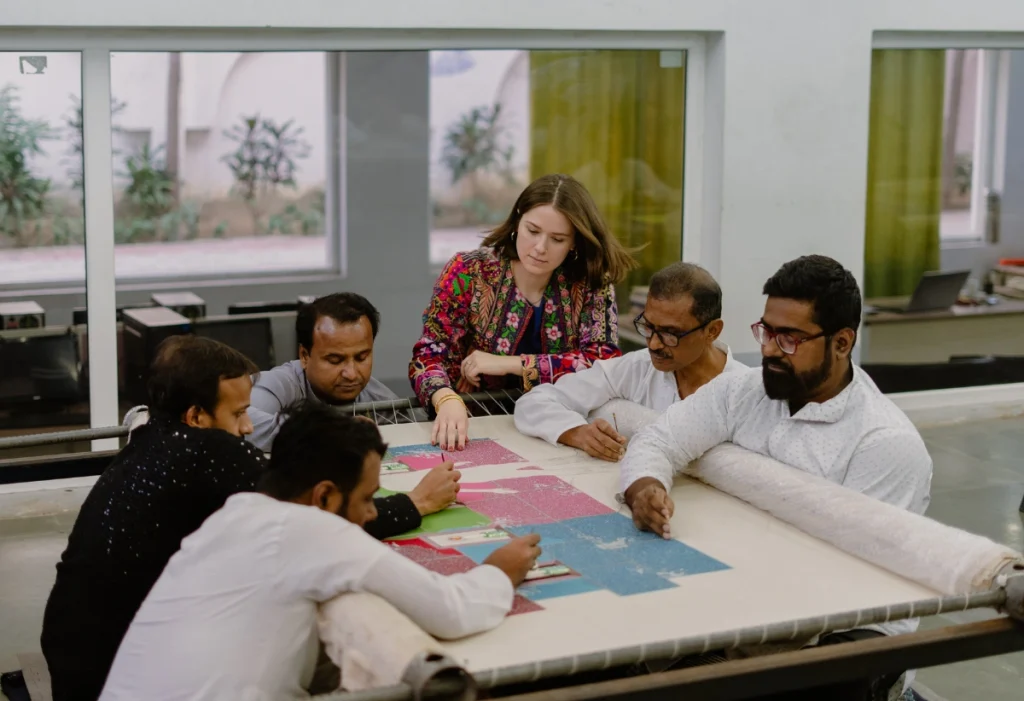 Lauren Januhowski at work with embroiderers at Kalhath Institut (Lucknow) Courtesy - Samuel Adams